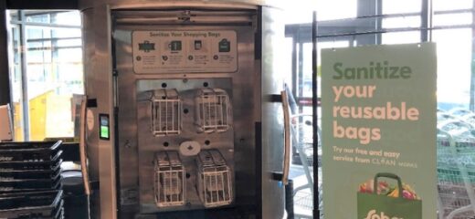 A picture of a sanitizing machine and a banner with text reading 