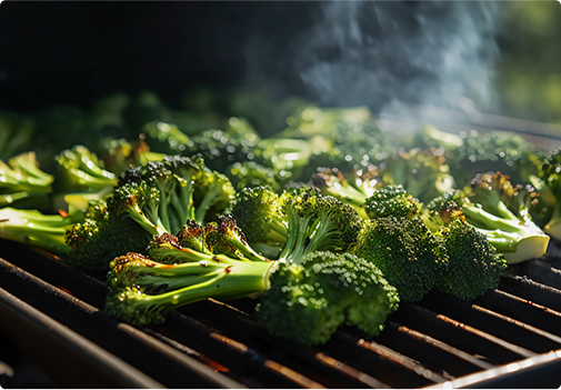 Broccoli florets and stems on a grill